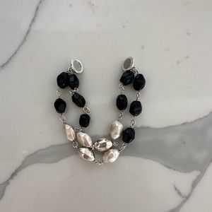 Milor Italy stainless steel and onyx magnetic clasp bracelet.